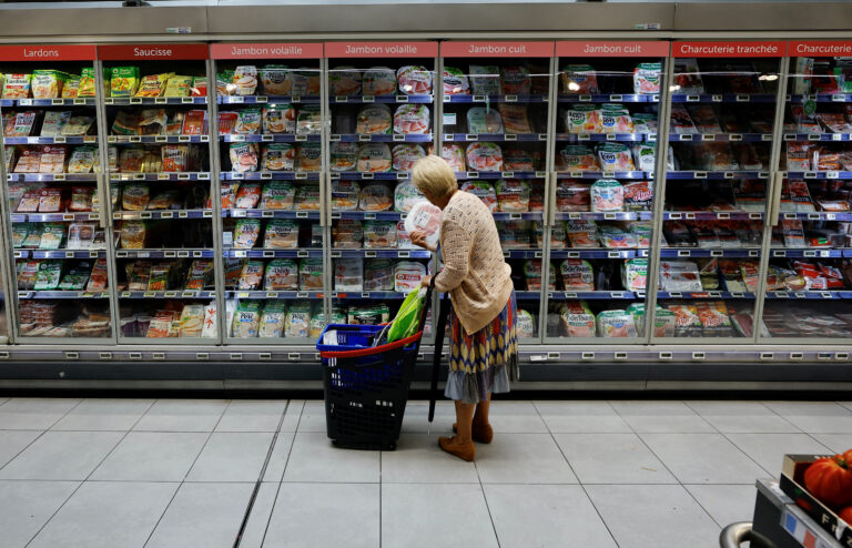 A customer shops in a supermarket in Nice, France