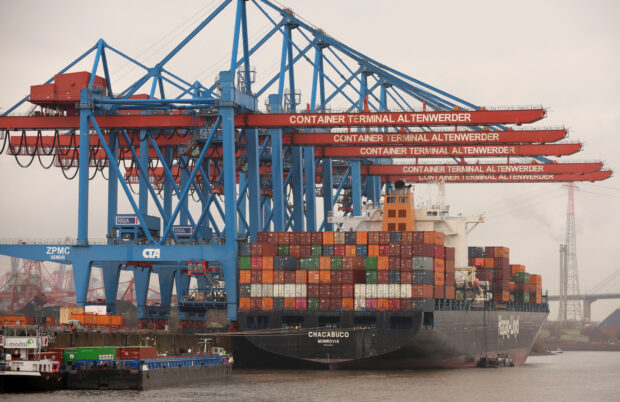 Containers are unloaded at Hapag-Lloyd container ship Chacabuco