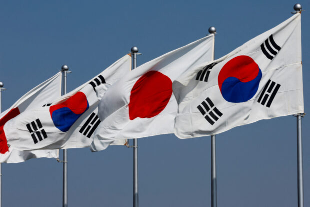 South Korean and Japanese flags