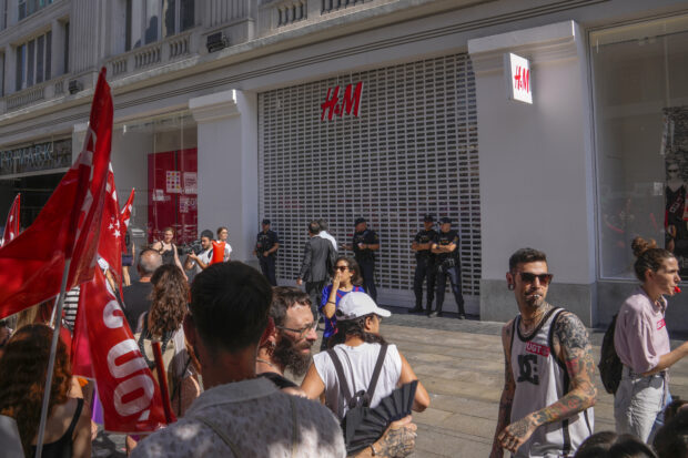 H&M staff protest in front of a closed branch