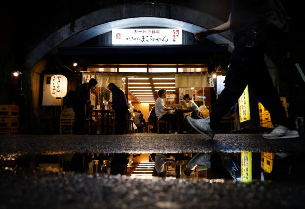 People in an izakaya pub restaurant in Tokyo