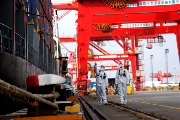 Container ship at Nanjing port in Jiangsu