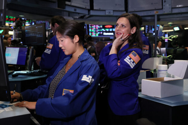 Traders on the floor of the NYSE