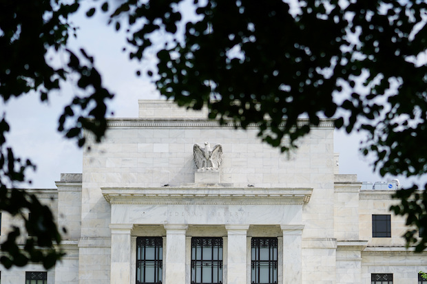 Fed raises interest rates, leaves door open to another increase