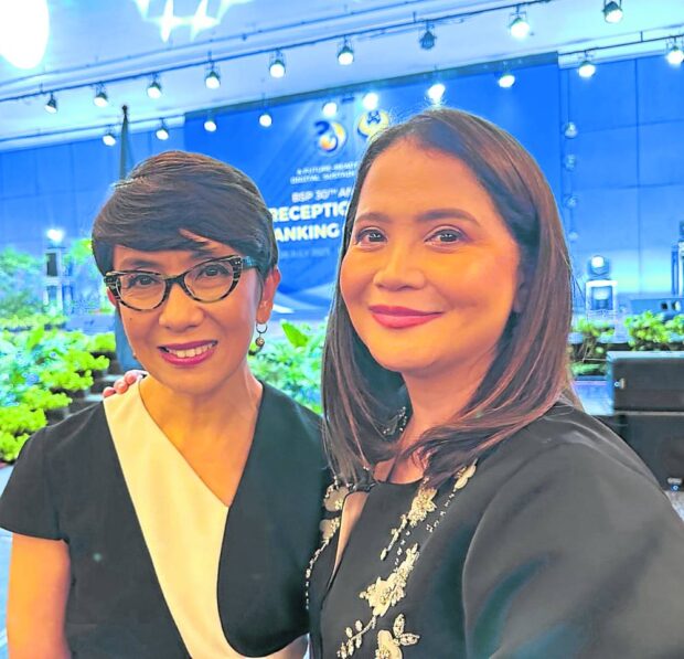 WOMEN LEADERS Landbank CEO Lynette Ortiz and BSP DeputyGovernor Bernadette Romulo-Puyat —DORIS DUMLAO-ABADILLA