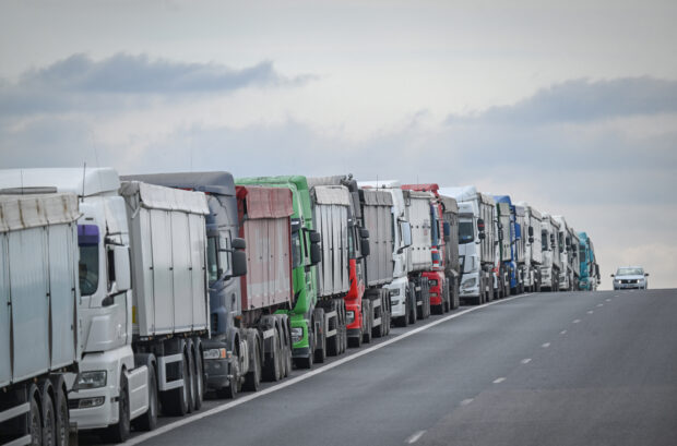Partial view of a four-kilometer queue of grain transporting trucks