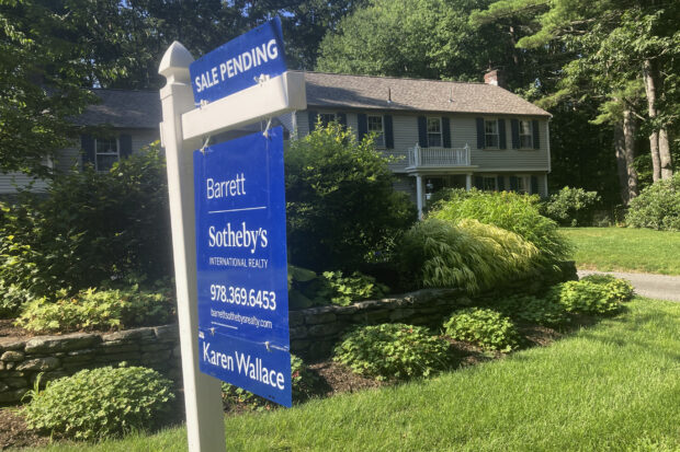 Sign noting a pending sale in front of a home in Concord, Mass