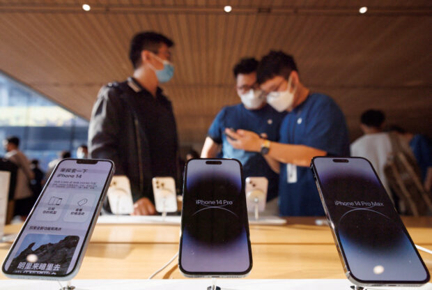 Customers in an Apple store in Beijing