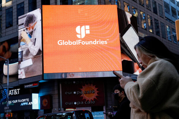 A screen displays GlobalFoundries' logo