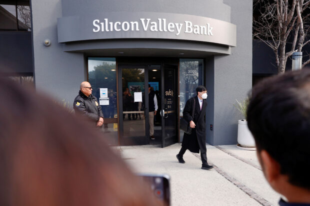 Customer leaving a Silicon Valley Bank branch in Santa Clara, CA