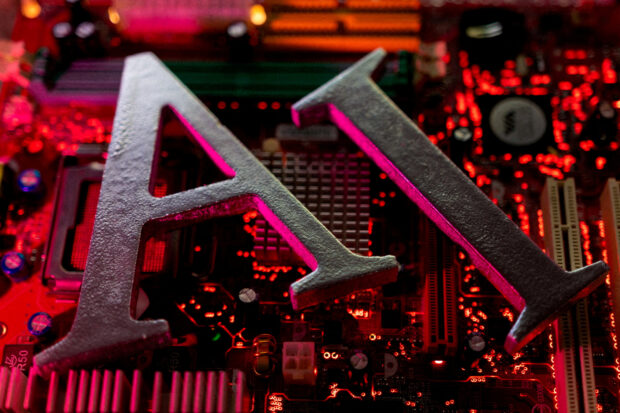 AI letters on a computer motherboard