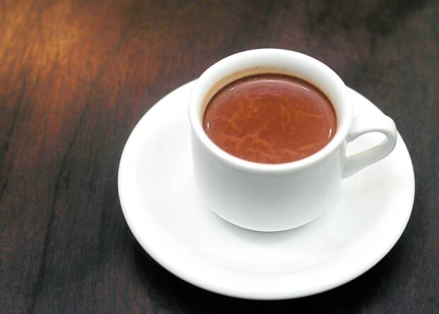 A steaming cup of Malagos chocolate drink