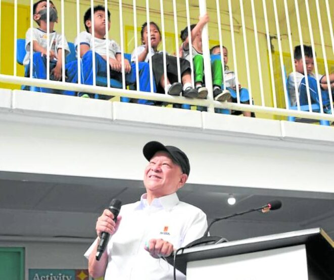 BIG DONATION SMC chief Ramon Ang formally opens the Better World Smokey Mountain community center on Friday in Tondo, Manila. —PHOTO FROM SMC