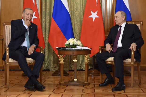 Russian President Vladimir Putin speaks to Turkish President Recep Tayyip Erdogan