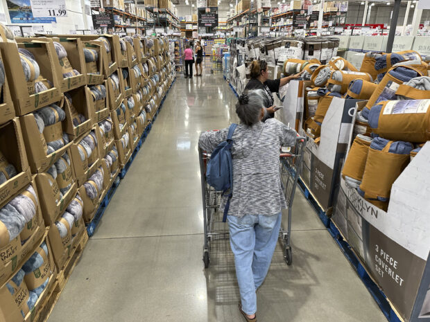 Shoppers at Costco warehouse in Sheridan, Colo.