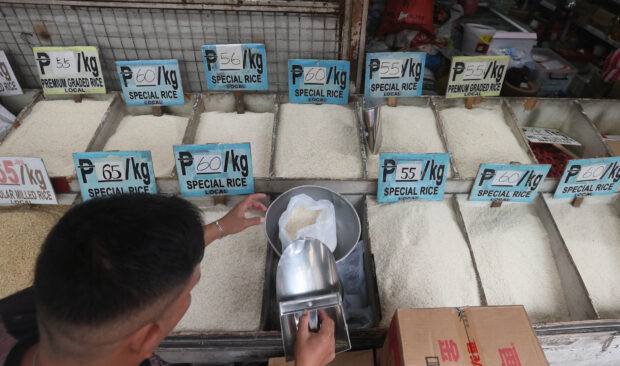 September 4 2023A vendor tends to his rice stall in Cartimar, Pasay city on monday as the price ceiling for regular and well-milled rice in the country will be effective on September 5, tuesday at P41 and P45 per kilogram. Malacanang declared the executive order in response to the increasing prices of rice caused by several factors such as illegal price manipulation, rising oil prices and global conflict. INQUIRER/ MARIANNE BERMUDEZ