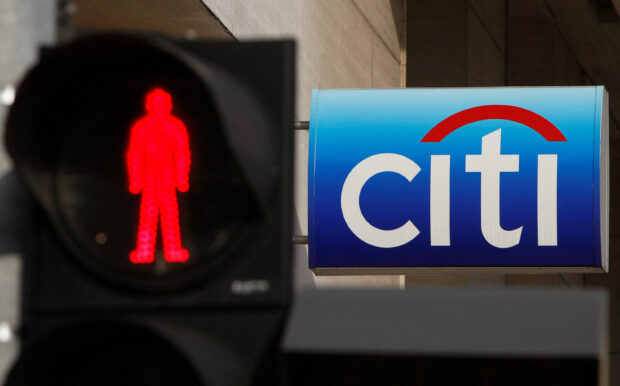 A traffic light seen in front of a Citibank branch in Singapore