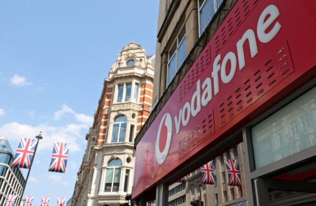Vodafone sign at one of its stores in London