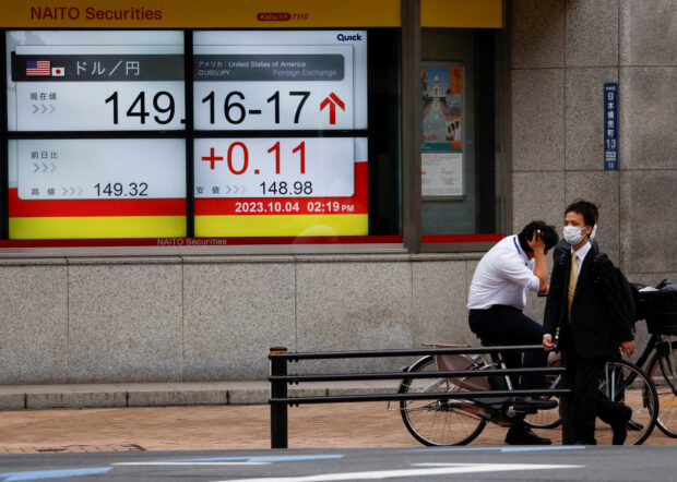 An electronic board showing the yen-dollar exchange rate 