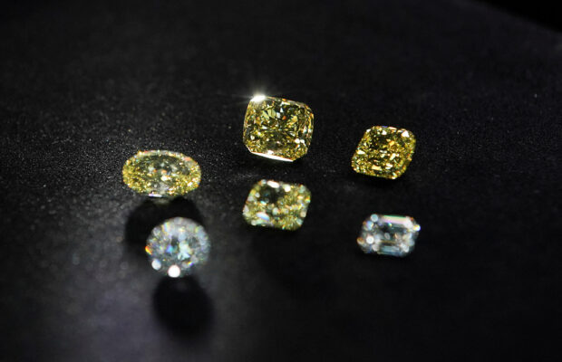 Polished colorless and yellow diamonds produced in factory in Moscow