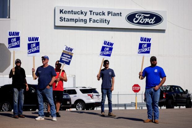 UAW union members picket outside Ford's Kentucky truck plant