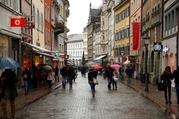People on a shopping street in the southern German town of Konstanz