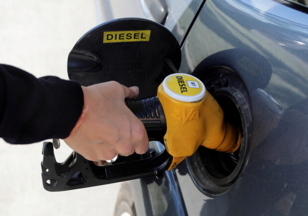 A diesel fuel nozzle with new European labels to standardize gasoline pumps in the EU zone