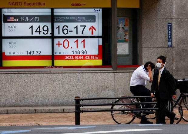 Electronic monitor showing the yen-dollar exchange rate in Tokyo