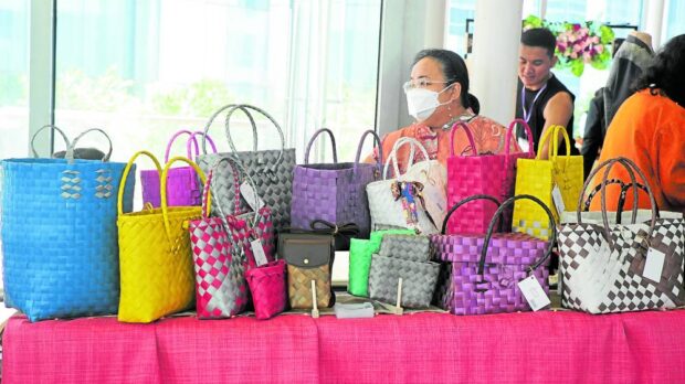 NOTMASS-PRODUCED Colorful bags showcased at theforumorganized by Women’s Business Council Philippines and Women at Work. —CONTRIBUTED