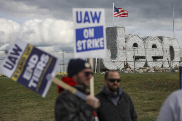 Striking UAW workers picket at the Jeep assembly plant in Ohio