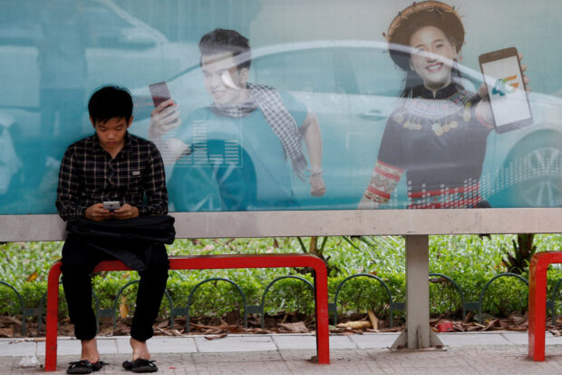 An internet user browses the internet in Hanoi, Vietnam