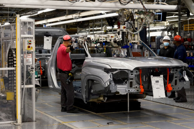 A worker assembles parts of Tundra Truck at Toyota's plant in San Antonio, Texas