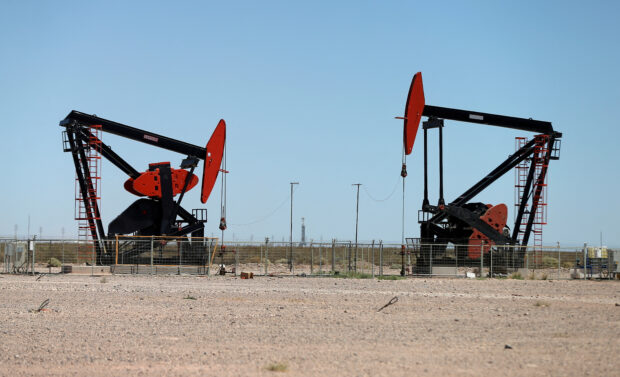 Oil pump jacks at Vaca Muerta shale oil and gas deposit in Argentina