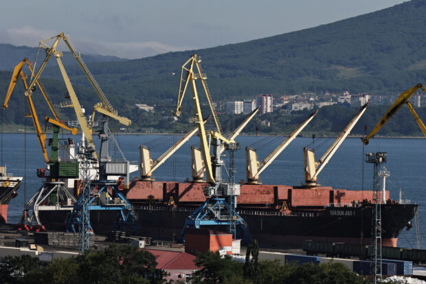 A bulk carrier in the Vostochny container port in Nakhodka Bay, Russia