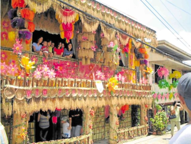 Colorful decorated houses during the annual Pahiyas Festival in Lucban, Quezon (LENAREH VIA FLICKR)