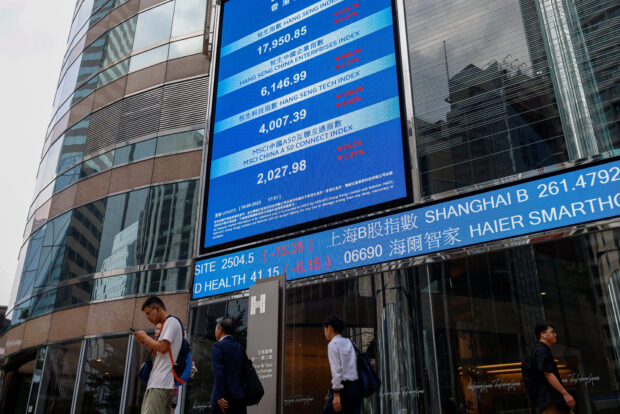 Screens showing the Hang Seng stock index