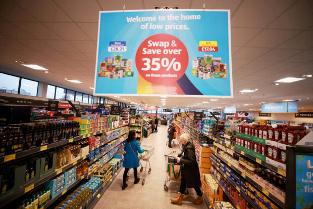 Shoppers at an ALDI supermarket in Britain
