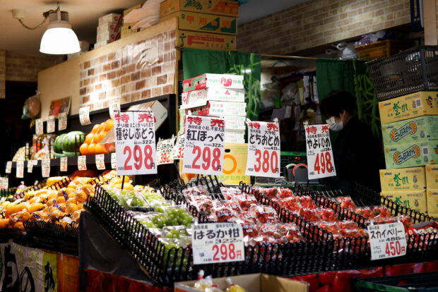 A vegetable stand with prices on display at a supermarket in Tokyo