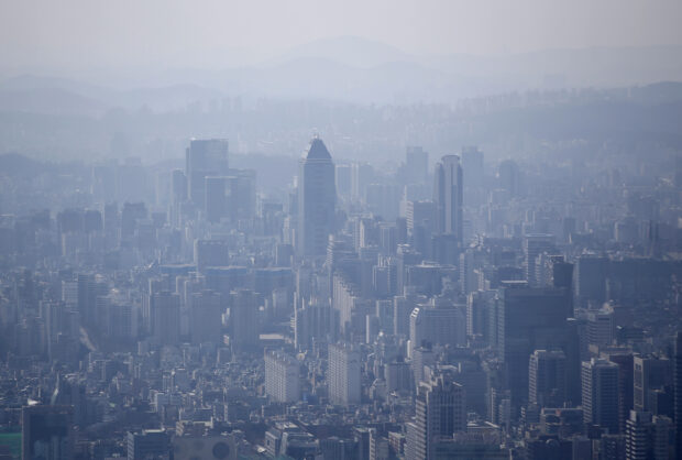 The skyline of central Seoul during foggy day