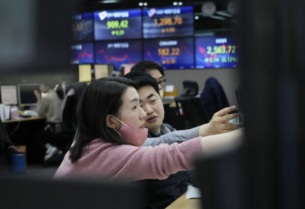 Asian shares mixed as BOJ keeps monetary policy unchanged