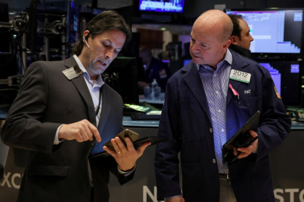 Wall Street ends down as US retail sales data crimps rate cut bets