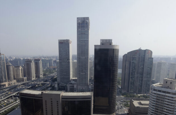 Beijing sets 2024 growth target higher despite slowing economy