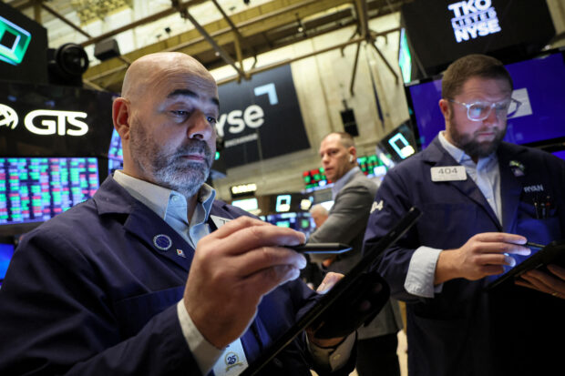 S&P 500 ekes out another record high as Netflix, chipmakers leap