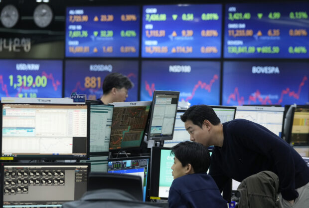 Asian shares rise after Wall St nears record; markets eye inflation report