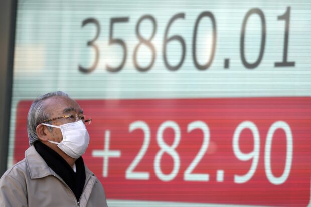 Asia stocks follow Wall St higher, while China keeps key rate unchanged