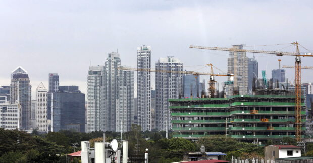 Another skyscraper is currently being built amongst a number of high rise buildings in Metro Manila as the Philippine economy grew faster than anticipated in 2022 as the fourth quarter GDP (gross domestic product) growth reached 7.2 percent according to a preliminary data released by NEDA, exceeding the 6.5 to 7.5 percent target set by economic managers. INQUIRER/ MARIANNE BERMUDEZ