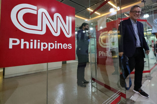SAD DAY FOR THE MEDIA Veteran broadcast journalist and senior anchor Rico Hizon leaves the CNN Philippines headquarters in Mandaluyong City on Monday after the local franchise holder of the global media brand announced it will cease operations on Jan. 31 due to financial losses. —GRIG C. MONTEGRANDE