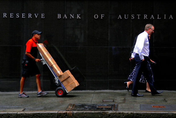 Australia's central bank holds rates as inflation cools