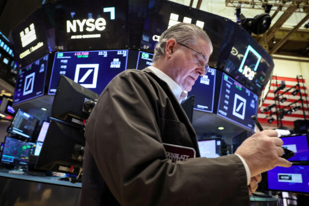 Wall St slides as hot inflation data dampens early rate-cut hopes