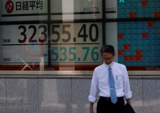 SYDNEY, (Reuters) - Asian shares got off to a slow start on Monday as fading chances for early rate cuts globally soured the mood, though investors are hoping China markets return from holiday with a spring in their step.A holiday for U.S. markets also made for thin trading, while the latest surge in tech stocks is set to be tested by results from AI diva Nvidia on Wednesday. MSCI's broadest index of Asia-Pacific shares outside Japan edged up 0.2%, after bouncing 2% last week. Japan's Nikkei was flat, having surged more than 4% last week to stop just short of its all-time high. [.T] There was promising news from China where tourism revenues during the Lunar New Year break surged by 47% on a year earlier as more than 61 million rail trips were taken. The country's central bank skipped a chance to cut rates again on Sunday, likely to limit downward pressure on the yuan, but with deflation looming analysts see plenty of scope for further policy stimulus. The same cannot be said for the United States following high readings on producer and consumer prices, that saw markets sharply scale back pricing for rate cuts. Bruce Kasman, global head of economics at JPMorgan, warned the Federal Reserve's favoured measure of core personal consumption inflation could now jump by 0.5% in January. Only a week ago, markets were hoping for a rise of just 0.2%. "While it is premature to place significant weight on noisy January data, risks have shifted in the direction that core inflation and labour market conditions both surprise the Fed in a hawkish direction in the first half of 2024," Kasman wrote in a note. "This stall has been expected to delay the start of the developed world easing cycle to midyear, and curb enthusiasm about the overall magnitude of the easing cycle ahead." Futures have sunk to imply just a 28% chance rates will be cut in May, when it was considered a done deal a couple of weeks ago. Markets have taken out two quarter point rate cuts for this year to imply less than 100 basis points of easing. HANGING ON NVIDIA The surprise on inflation means the minutes of the Fed's last policy meeting out this week now look dated, but any talk about the timing of potential cuts will be noted. There are plenty of Fed speakers out this week to comment on the outlook, with Fed Vice Chair Philip Jefferson and Governor Christopher Waller of particular interest. The market sea change on rates saw two-year Treasury yields spike to a new 2024 high of 4.72% on Friday before steadying at 4.65%. Treasury futures were little changed on Monday with the cash market closed. S&P 500 futures were up 0.1%, while Nasdaq futures added 0.2% on hopes Nvidia could somehow beat already stratospheric expectations. The chipmaker's stock has surged 46% so far this year and accounted for more than a quarter of the S&P 500's gains. There is reason for optimism given that of the 80% of S&P 500 reporting so far, 75% have beaten forecasts. Goldman Sachs cited profits in the tech sector last week when it raised its year-end S&P 500 index target to 5,200, from 5,100. "Our upgraded 2024 EPS forecast of $241 - 8% growth - stands above the median top-down strategist forecast of $235," said Goldman. "We expect P/E valuation multiples will remain close to current levels, making earnings growth the primary driver of remaining upside this year." Higher bond yields were underpinning the dollar at 150.07 yen, though the threat of intervention has so far capped it at 150.88. The euro has also reached its highest so far this year on the yen at 161.95. [FRX/] The single currency was steady on the dollar at $1.0784, having met resistance just above $1.0800. The rise in yields has been a burden for non-yielding gold, which was idling at $2,014 an ounce. [GOL/] Oil prices were softer in early trade as concerns about demand tussled with the threat of supply disruptions in the Middle East. [O/R] Brent slipped 32 cents to $83.15 a barrel, while U.S. crude for April fell 33 cents to $78.13 per barrel.